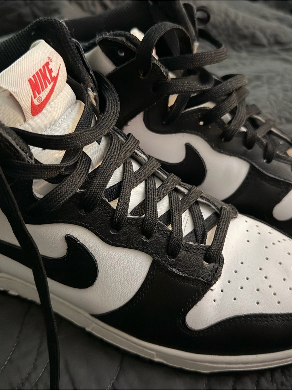 Nike Women’s Black and White High-Top Sneakers with Red Logo